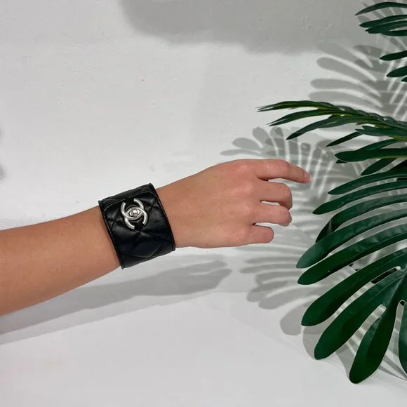 CHANEL Black Quilted Leather Cuff with Silver-Tone CC Logo Chanel CC Turnlock Black Quilted Leather Cuff Bracelet  main image 3